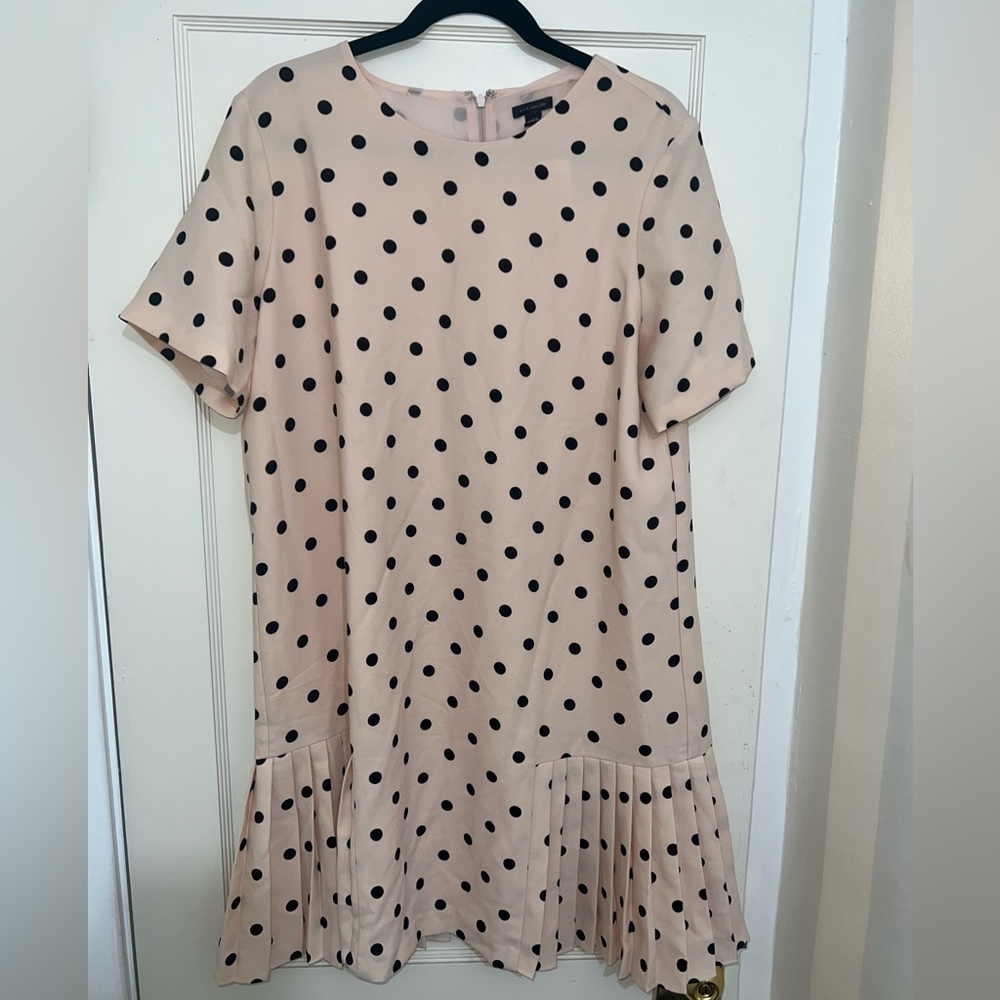 And Taylor, pink and black polkadot mini dress